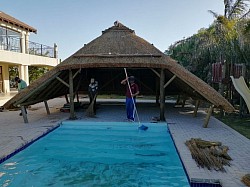 Swimming pool - thatched lapa